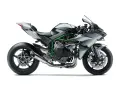Kawasaki Ninja H2R, sportowy motocykl z zieloną ramą i srebrnymi panelami, gotowy do wyścigów.