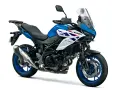 Niebiesko-biały Suzuki SV650X, jeden z najlepszych motocykli, gotowy na przygodę.