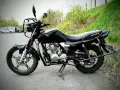 Czarny motocykl Zetka 50cc. Idealny na pierwsze przygody na dwóch kółkach, od ilu lat można jeździć 50cc? Od 14 roku życia!