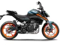 Niebiesko-czarny KTM Duke 125 z pomarańczowymi felgami. Poznaj jego dane techniczne i poczuj moc!