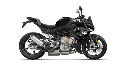Czarny motocykl BMW S1000R z wydechem Akrapovič i złotymi elementami silnika. Gotowy do jazdy po mieście i torze.