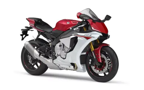 Sportowy motocykl Yamaha R1 2016 w kolorze czerwono-białym, gotowy do jazdy.