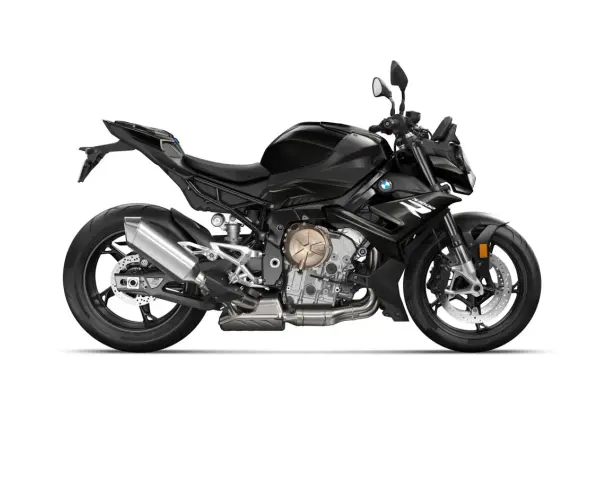 Czarny motocykl BMW S1000R z wydechem Akrapovič i złotymi elementami silnika. Gotowy do jazdy po mieście i torze.