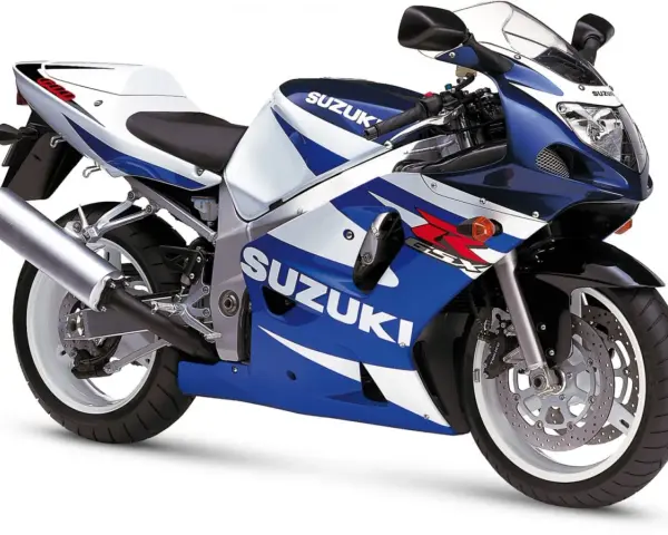 Suzuki GSX-R 600 SRAD w niebiesko-białych barwach, gotowy do jazdy po torze.
