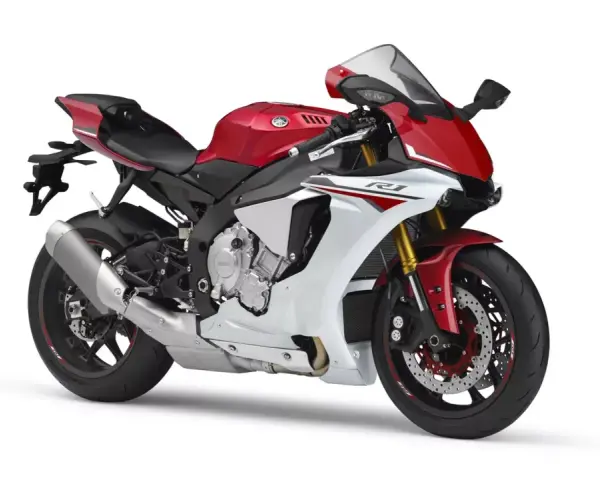 Sportowy motocykl Yamaha R1 2016 w kolorze czerwono-białym, gotowy do jazdy.