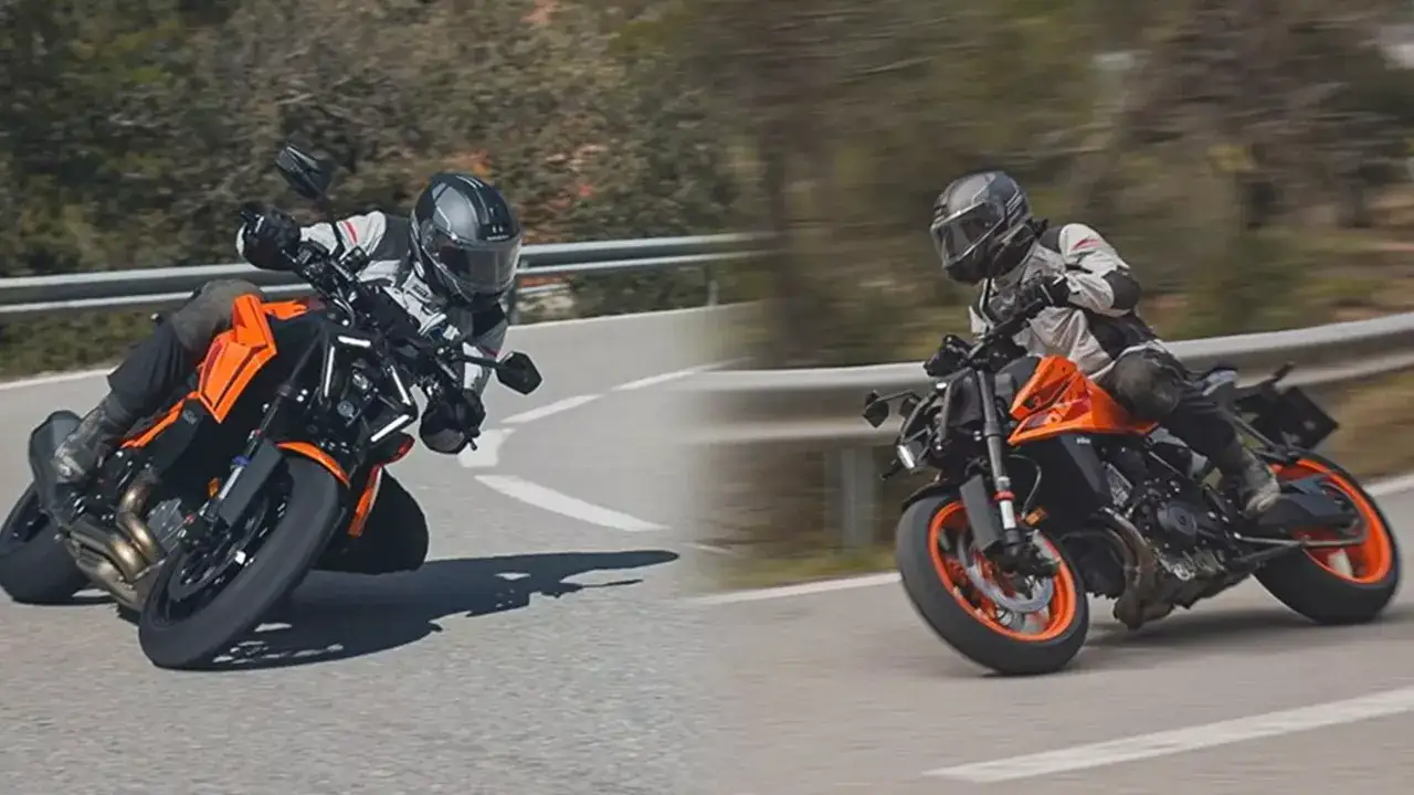 Dwóch motocyklistów na pomarańczowych motocyklach KTM Super Duke pokonuje zakręty na górskiej drodze.